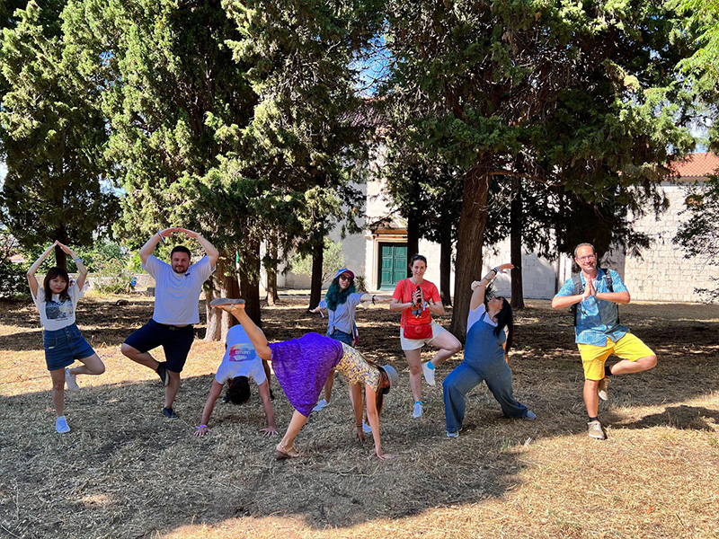 Employees participating in a purpose-driven scavenger hunt across urban landmarks