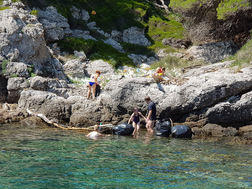 Employees filming a CSR project during a company event in Croatia