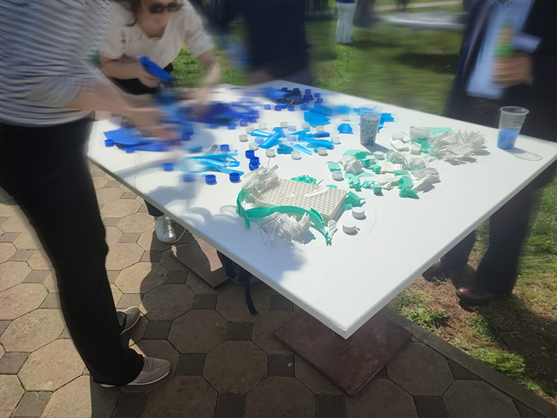 Company volunteers crafting sculptures from reused materials in Croatia